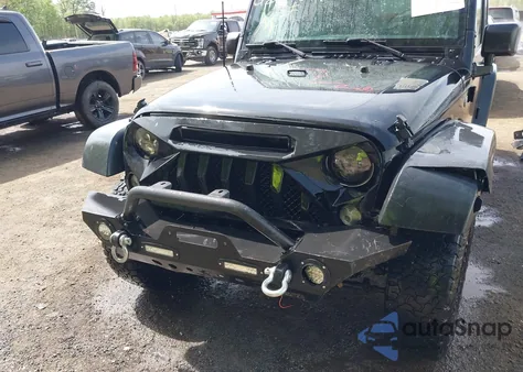 2016 Jeep Wrangler Unlimited Black Bear z USA, uszkodzony, nr VIN 1C4BJWDG6GL191982